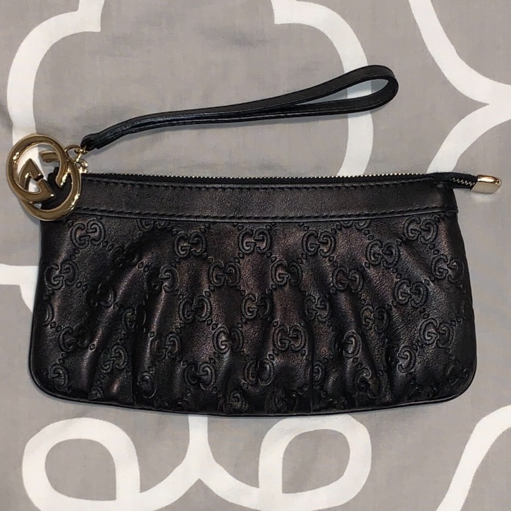Black authentic Gucci wristlet